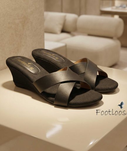 Women’s premium leather and natural jute sandal in black and orange color combination featuring cushioned insole, breathable design, and durable anti-slip sole perfect for summer casual and festive wear.